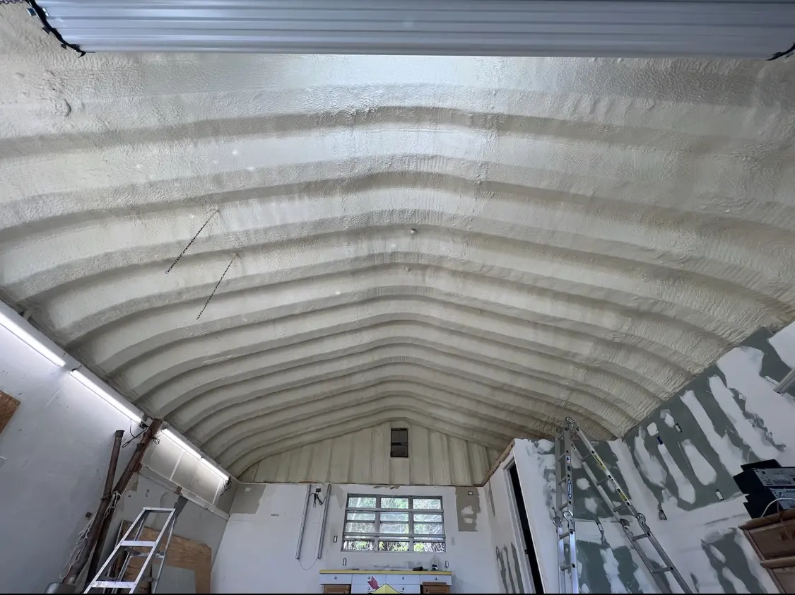 Spray polyurethane foam applied to the underside of a metal roof deck in Gaffney
